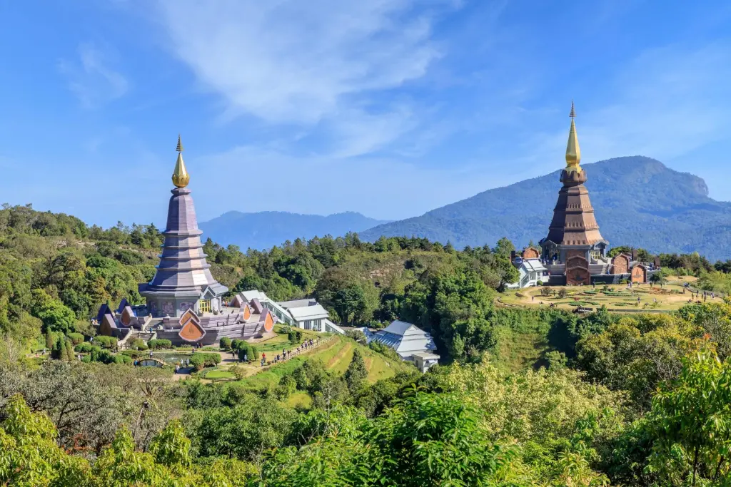 Scenic view of Doi Inthanon mountains at sunset, representing the beautiful location of Lodge Lanna in Chiang Mai.